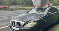 Cops baffled by fridge strapped on top of driver’s car