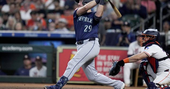 Seattle's Raleigh has record-setting home run ball personally delivered by Astros' staffer