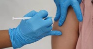 Covid cases continue to rise in UK as health bosses issue vaccine alert