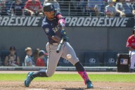 Julio Rodríguez drives in 2 with infield single, Mariners throw 2