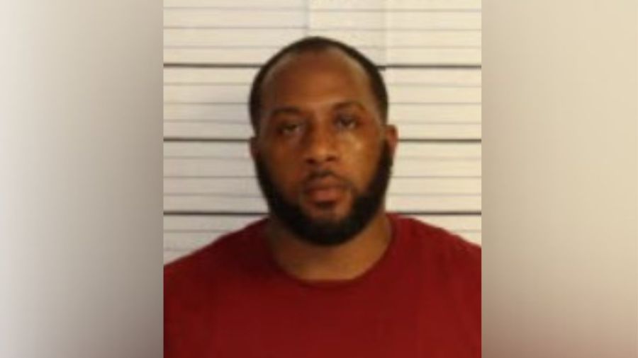 Father faces charges after pointing gun at high