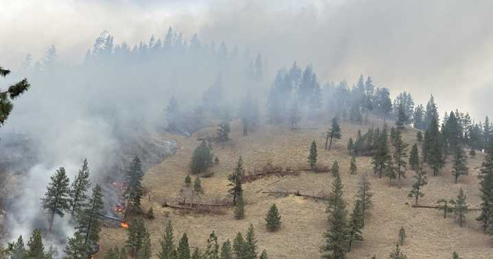 Crews battling wildfire west of Lolo
