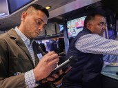 Wall Street rallies as a cut to interest rates next week looks more certain