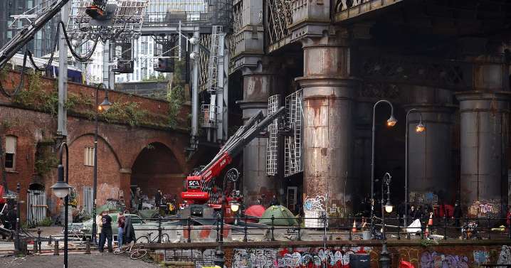 Historic Manchester arches double up for Gotham as superhero movie films in city centre