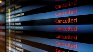 Cyberattack sparks delays and cancellations at Heathrow and major European airports as passengers urged to check flights
