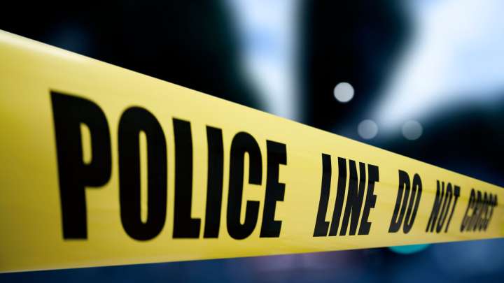 Man accused of killing roommate while leaving for football watch party