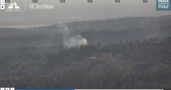 Firefighters from CAL FIRE stop forward spread of vegetation fire near Helltown
