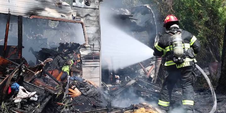 Marion County firefighters battle destructive RV fire