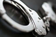 Man arrested on suspicion of arson after brush fire in North County