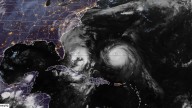 Imelda and Humberto deliver double threat — dangerous surf and flooding for US, back