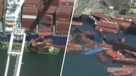 Contenedores de carga caen de un buque en puerto de Long Beach