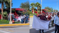Camiones y lonas de apoyo en informe de Andrea Chávez