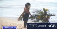 Friends of shark attack victim return to the waters