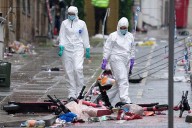Man accused of ramming car into Liverpool soccer parade pleads not guilty to 31 charges