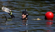 With hidden evidence on their minds, unusual dive team takes to the Chicago River
