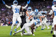 Lions rise to the occasion, down Ravens in heavyweight fight