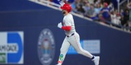 Bryce Harper homers, honors late Davey Johnson