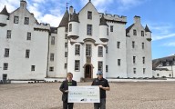 Atholl Estates presents cheque to mountain rescue team