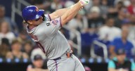 Alonso and Holmes lead Mets past Marlins 5-0 to push NL wild-card race to final day of season