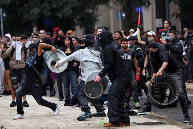Mass protests erupt across Italy sparking clashes with police