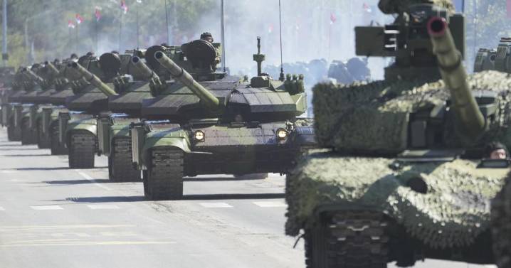 Serbia stages a large military parade to showcase tanks, jets and missile systems