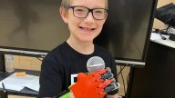 Red Cross Elementary teacher builds 3D-printed hand for student, inspires confidence for the future