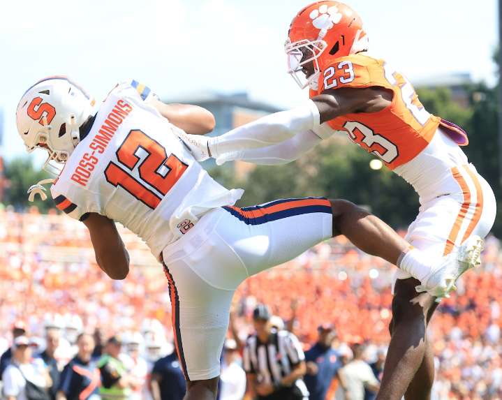 Syracuse crushes Clemson behind gutsy onside kick but may have lost its leader, Steve Angeli, in the process
