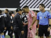 Miami's Luis Suarez banned six matches for spitting incident