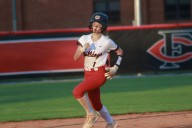 Softball: Bulldogs roll past Spartans for home win