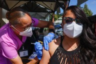 Major California health insurers side with Newsom and medical groups to cover COVID shots