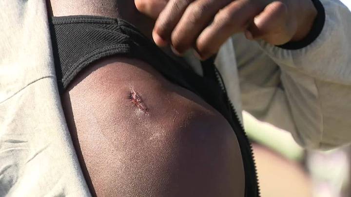 Father shot while protecting son from armed teens