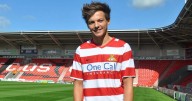 Louis Tomlinson duped by criminals in multi-million Doncaster Rovers fraud plot