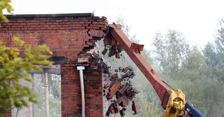 'It's like a house of cards': Demolition begins at Pioneer Mill after huge blaze leaves firefighter seriously injured