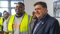 Gov. JB Pritzker posed for photo with anti-violence worker later charged in fatal Mag Mile smash-and