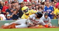 Tigers clinch AL playoff berth with 2-1 win over Red Sox. Detroit's division hopes still alive