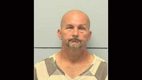 Man charged after 2 found dead in home after fire