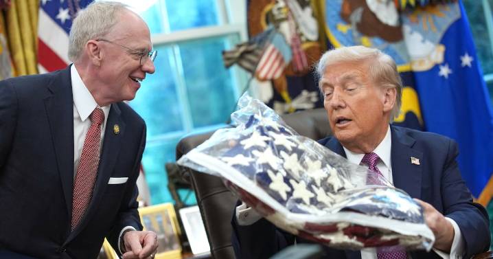 Donald Trump Appears to Mistake American Flag for Cozy Blanket