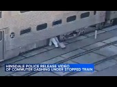 Dramatic video shows woman crawl under Metra train in west suburbs