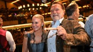 Schwarzenegger directs a band in a beer tent at Munich's Oktoberfest