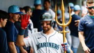 Mariners' Cal Raleigh ties record, sets another with 54th home run