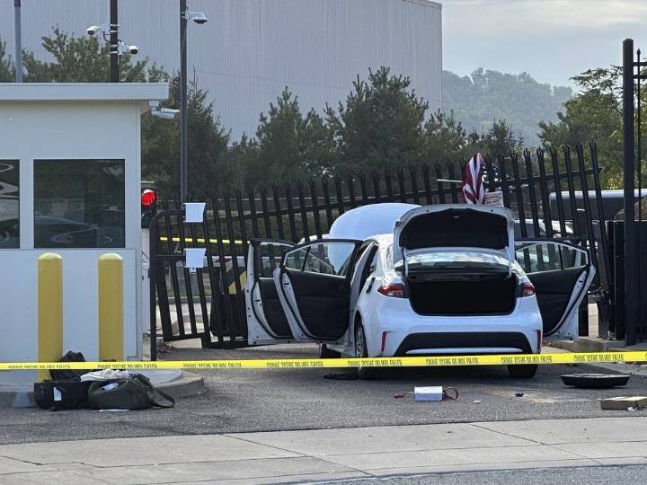 Man flees after ramming car into FBI building, throws American flag over gate