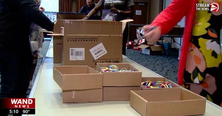 UIS students assemble 1,000 care kits for military members