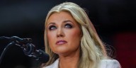 Erika Kirk Surprises Crowd with Hand Gesture Toward Charlie Kirk's Photo After Hug from Trump
