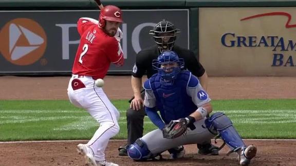Surging Reds blank Cubs, move into tie for NL wild card spot
