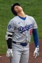 Dodgers star Shohei Ohtani, fighting an illness, has 2 hits after opting not to pitch vs. Pirates