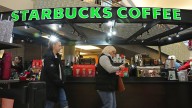 Starbucks to close hundreds of stores, lay off 900 workers as part of turnaround plan