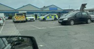 Woman arrested after axe alert saw UK schools placed in lockdown