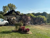 Deaths of two people found after house fire investigated as suspicious