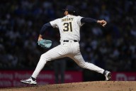 Brewers designate reliever Payamps for assignment, promote Zimmermann