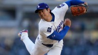Shohei Ohtani gets first victory with Dodgers, striking out season